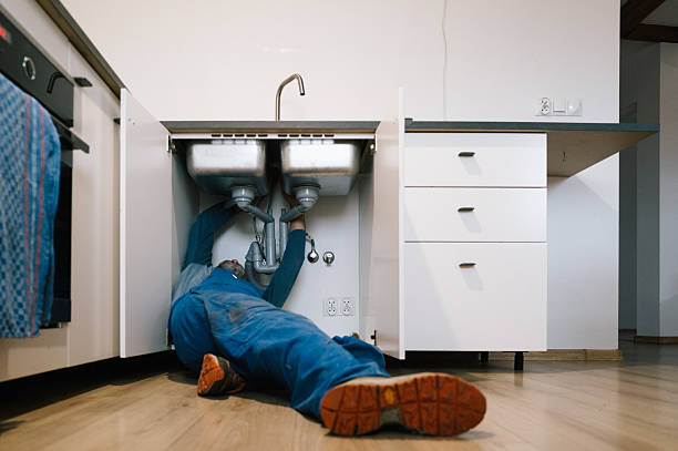Professional Drain Cleaning technician working in Oxbow, NY